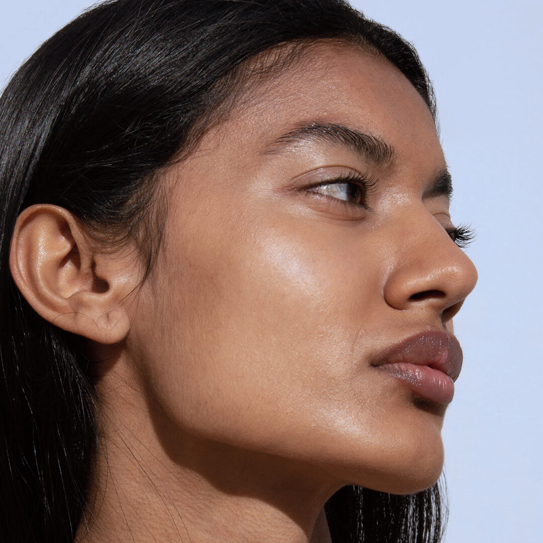 Side profile of woman with minimal makeup
