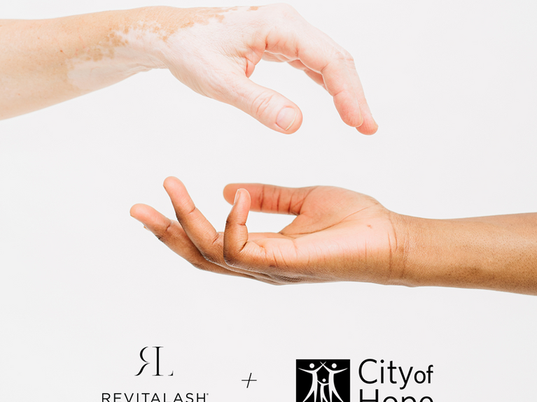 image of hands over each other with City of Hope logo and RevitaLash Cosmetics logo
